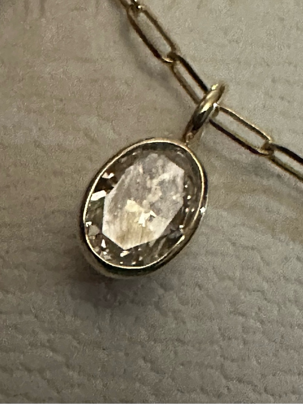 GIA certified 1.20ct oval all natural diamond! Bezel set in 14kt yellow gold.
